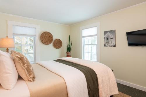 Ένα ή περισσότερα κρεβάτια σε δωμάτιο στο Tucker Hill Lodge