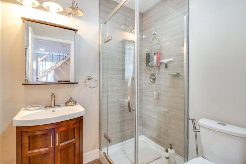 a bathroom with a shower and a sink and a toilet at Near Hiking and Golf Cozy Cottage in Morgan Hill! in Morgan Hill