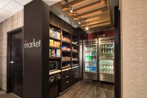 a store with a large refrigerator with drinks in it at Courtyard by Marriott Rock Hill in Rock Hill