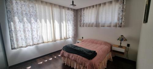 Katil atau katil-katil dalam bilik di Como en casa, Excelente ubicación, Vista inmejorable