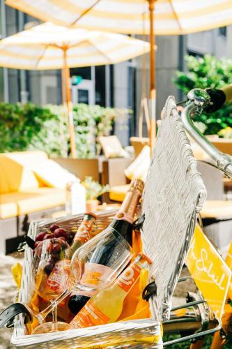 a basket filled with bottles of drinks on a bike at Le Meridien Munich in Munich