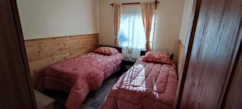 Ένα ή περισσότερα κρεβάτια σε δωμάτιο στο valle escondido