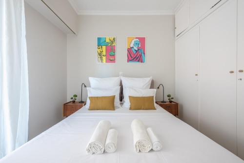 Voodi või voodid majutusasutuse Spacious 2BDs Apt With Acropolis View In Center toas