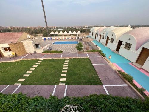 an aerial view of the courtyard of a resort at Horus Mini Resort in Cairo
