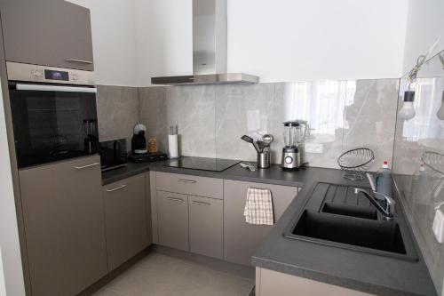 Una cocina o cocineta en Machelen