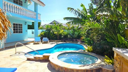 Πισίνα στο ή κοντά στο Elegant 1-bedroom apartment 3 km from Eagle beach