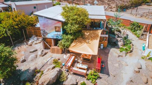 an aerial view of a house with a swimming pool at Casa de Colores de Totoralillo in Totoralillo