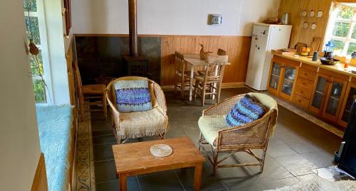 Ruang duduk di Cabaña en tu propia Isla