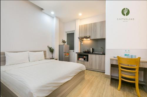 Cuisine ou kitchenette dans l'établissement Cactusland Hotel & Apartment