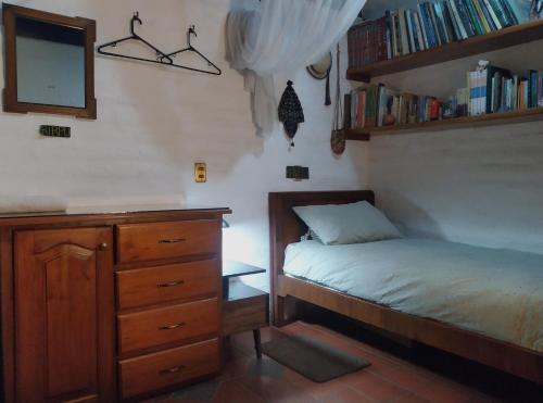 Katil atau katil-katil dalam bilik di Casa del Aguacate Cumbaya - Tumbaco