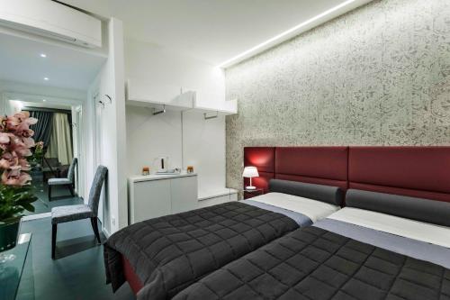 A bed or beds in a room at Residenza Monfy