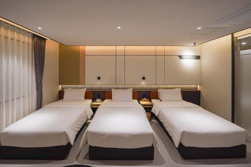 Voodi või voodid majutusasutuse Urban Groove Hotel Seomyeon toas