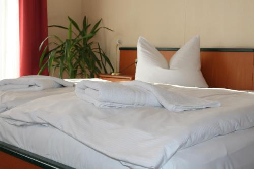 Ένα ή περισσότερα κρεβάτια σε δωμάτιο στο Hotel Villa Elisabeth