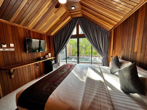 Postel nebo postele na pokoji v ubytování Poonsiri Resort Aonang-SHA Extra Plus