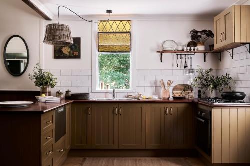 a kitchen with a sink and a window at The Church at Lyonville - Daylesford Region in Lyonville