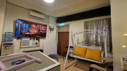 โทรทัศน์และ/หรือระบบความบันเทิงของ 富貴民宿Full Great B&B包棟名宿