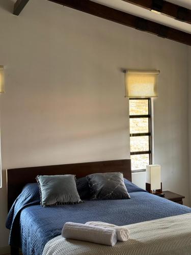 Cama o camas de una habitación en Mi terrunio-Alojamiento rural
