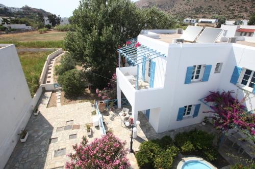 an aerial view of a white house with a swimming pool at Blue Sky in Galissas