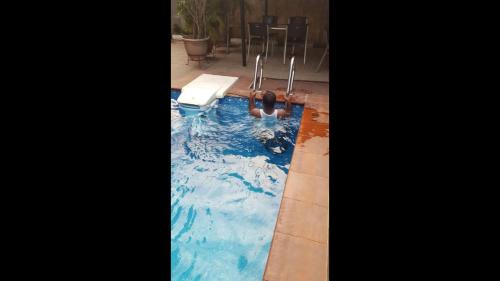 Der Swimmingpool an oder in der Nähe von Solab Hotel - Classic