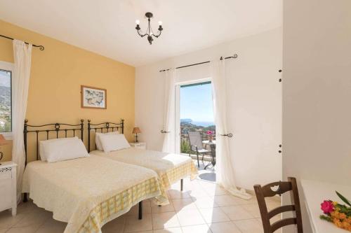 Posteľ alebo postele v izbe v ubytovaní Villa Eos by Villa Plus