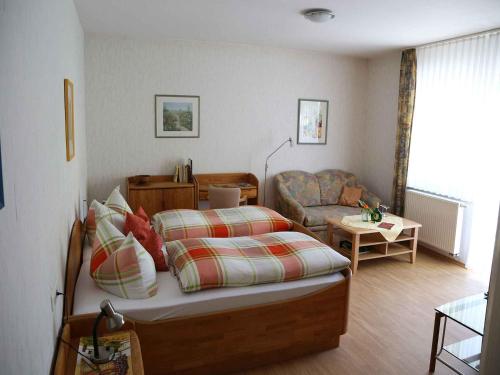Un pat sau paturi într-o cameră la Winzerhof Düring