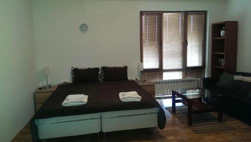 Кровать или кровати в номере Mountain View Apartment B23