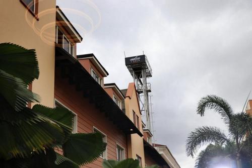 a fire hydrant on the side of a building at Leola Hotel-standard in Ikeja