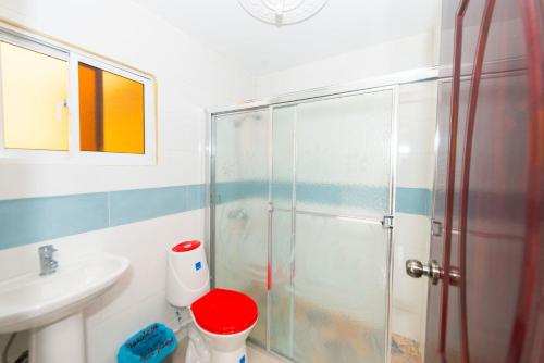 a bathroom with a shower and a sink at 2 Bedroom Apartment in Corales del Sur - Parque del Este - Las Americas Airport in La Viva