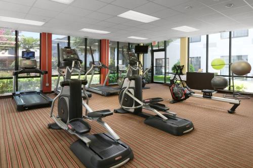 a gym with several treadmills and exercise bikes at Courtyard by Marriott Dallas DFW Airport North/Irving in Irving