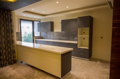 Η κουζίνα ή μικρή κουζίνα στο Pallacia - Luxury Apartment