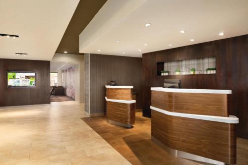 a hotel lobby with a reception desk at Courtyard by Marriott El Paso East/I-10 in El Paso