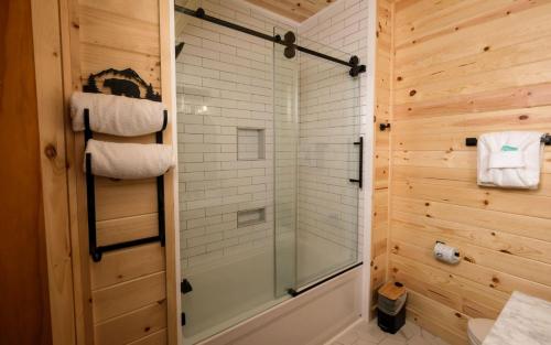 a bathroom with a shower with a glass door at Eagles Nest in Gatlinburg