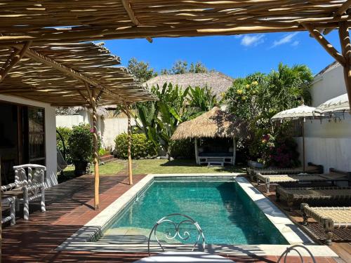 Πισίνα στο ή κοντά στο Jolie Villa provincial à Bali