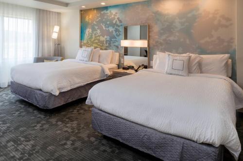 Postel nebo postele na pokoji v ubytování Courtyard by Marriott Elmira Horseheads