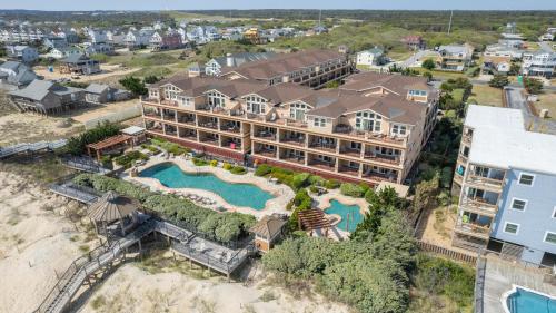 an aerial view of a resort with a pool at Croatan Surf Club by KEES Vacations in Kill Devil Hills