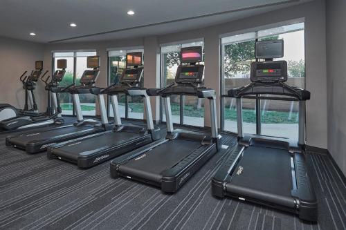 a row of treadmills in a gym at Courtyard Medford Airport in Medford