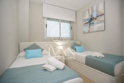 Postel nebo postele na pokoji v ubytování Casa Wesley Ivan Luxury Homes 9ªPlta Norte 1ªLinea