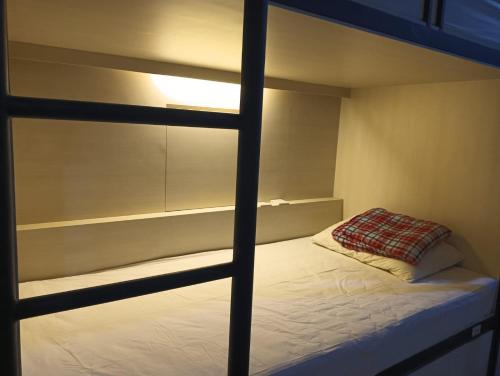 Cama o camas de una habitación en Heritel Urban Hostel