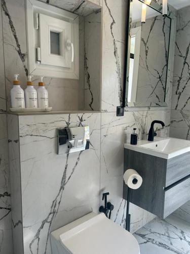 Bilik mandi di Nest suite by Oikies Rentals