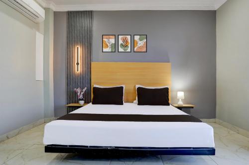 Ein Bett oder Betten in einem Zimmer der Unterkunft Hotel O The Bell Oak