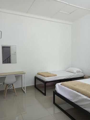 Ένα ή περισσότερα κρεβάτια σε δωμάτιο στο HT Home