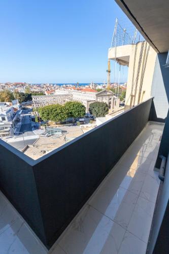a view from the balcony of a building at Anele Luxury Suites - Roof Top Jacuzzi in Chania Town