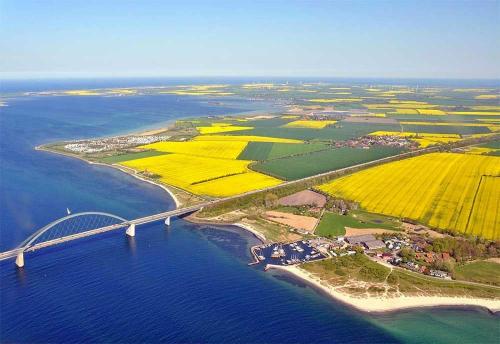 an aerial view of a bridge over the water at Villa Westwind Ferienwohnung Mala in Landkirchen