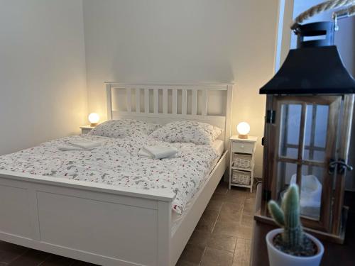 Apartmány Airoloにあるベッド
