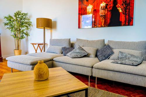 un salon avec deux canapés et une table basse dans l'établissement Eugénie - Gorgeous sea view AC WiFi - by TGB, à Ajaccio