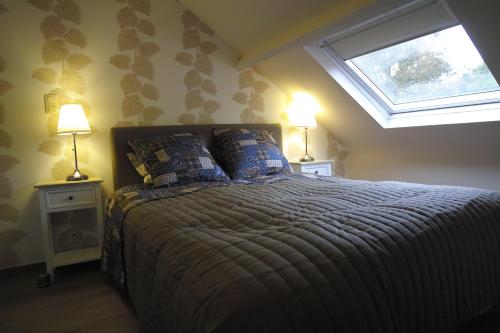 Postel nebo postele na pokoji v ubytování Bed & Breakfast De Kleine Magnolia
