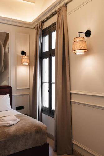 Airy Athens Suitesにあるベッド