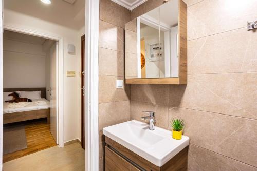 Ένα μπάνιο στο Elena's Cozy & Central Nest