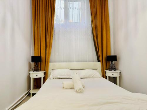 Postel nebo postele na pokoji v ubytování Joy City Stay Augustin 2