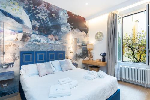 Foto ARIOSTO'S Luxury Rooms 1